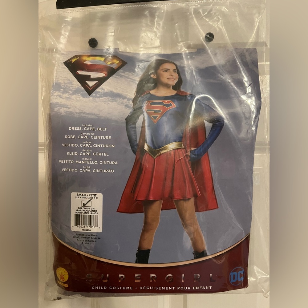 NEW in package Super Girl costume, size small (4-6)